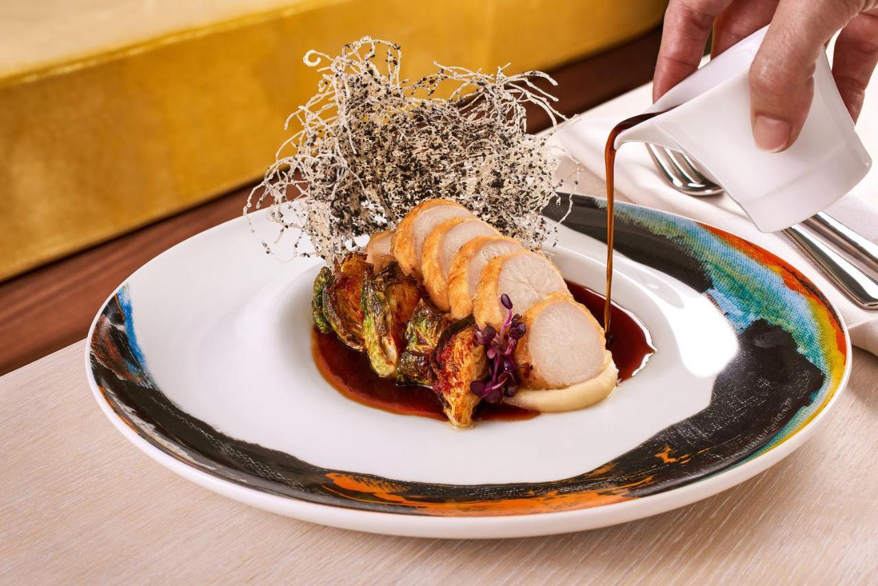 Ette Luxury Hotel & Spa Four Corners Bagian luar foto A plate of abalone