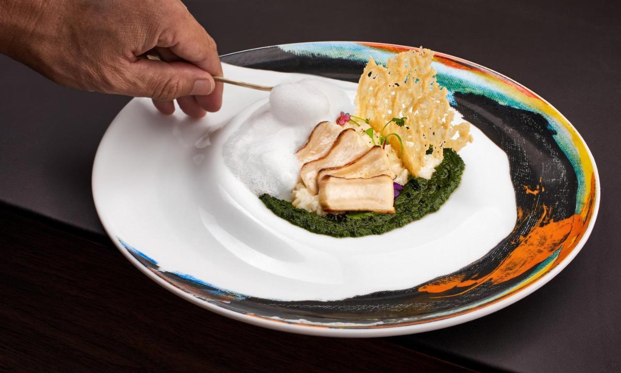 Ette Luxury Hotel & Spa Four Corners Bagian luar foto A plate of food