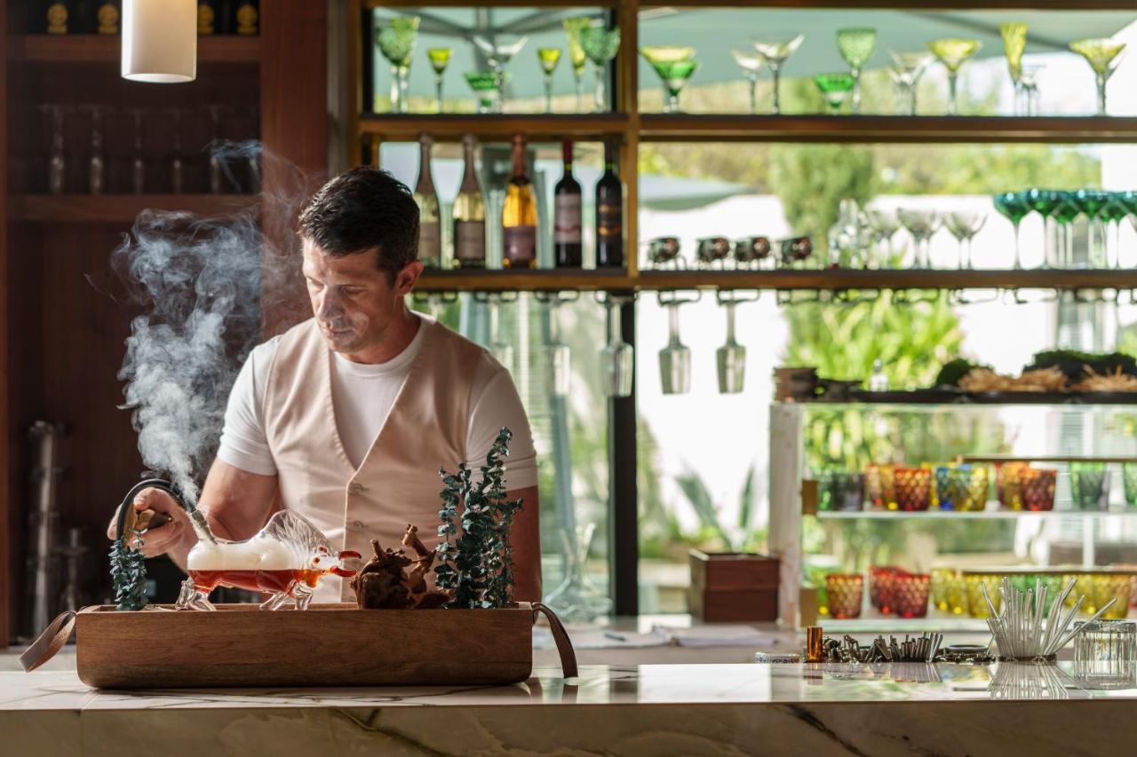 Ette Luxury Hotel & Spa Four Corners Bagian luar foto A chef preparing a meal
